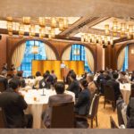 2024年度オデッセイアワード授賞式の会場風景。受賞者が集い、表彰の様子が映る。